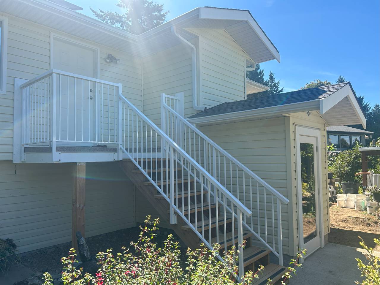 Mudroom and elevator addition - after - landing deck and stairs