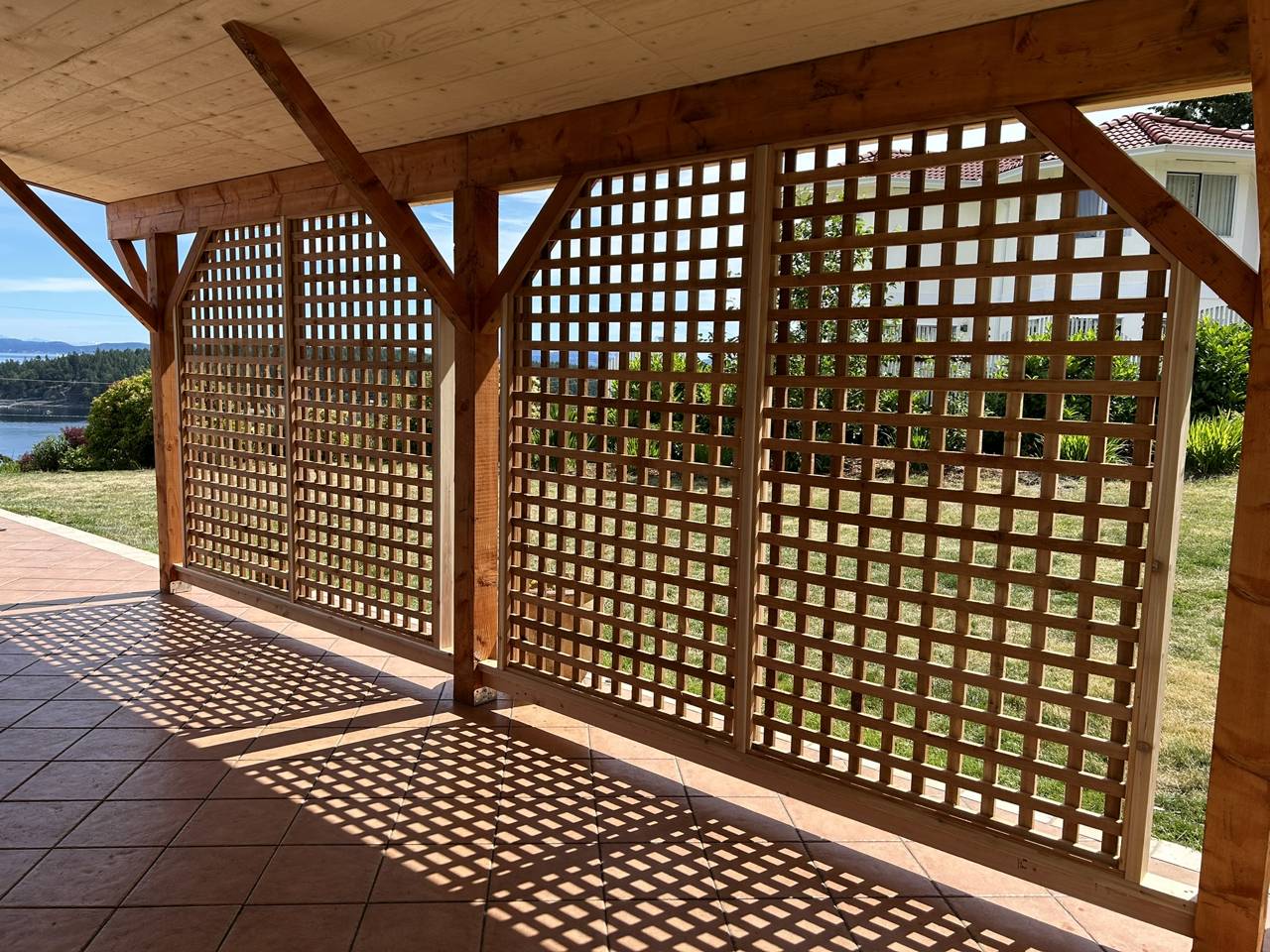 Custom outdoor living space - after - privacy screen